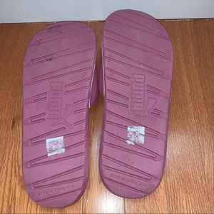 pink puma slides (size women’s 9)